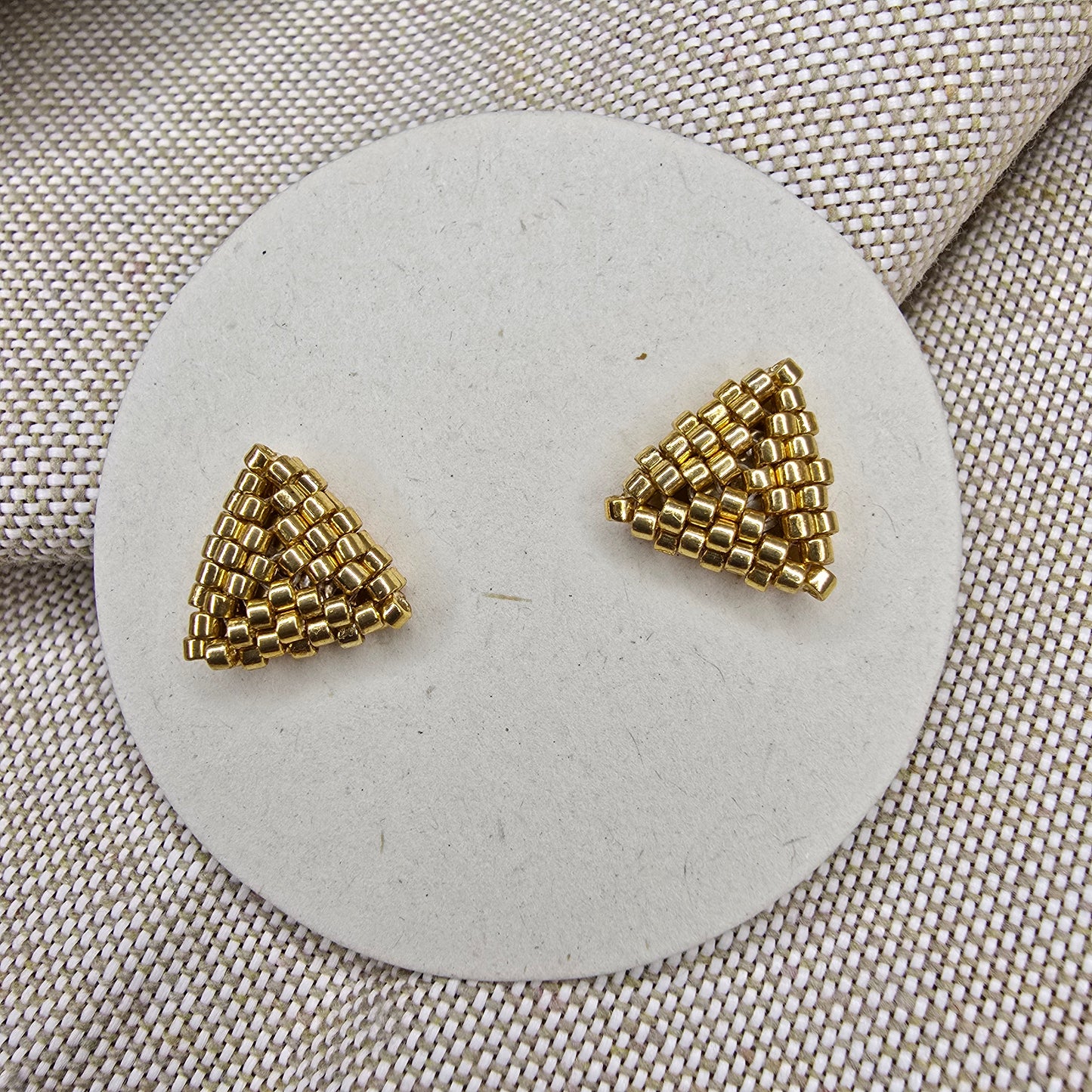 Triangle studs