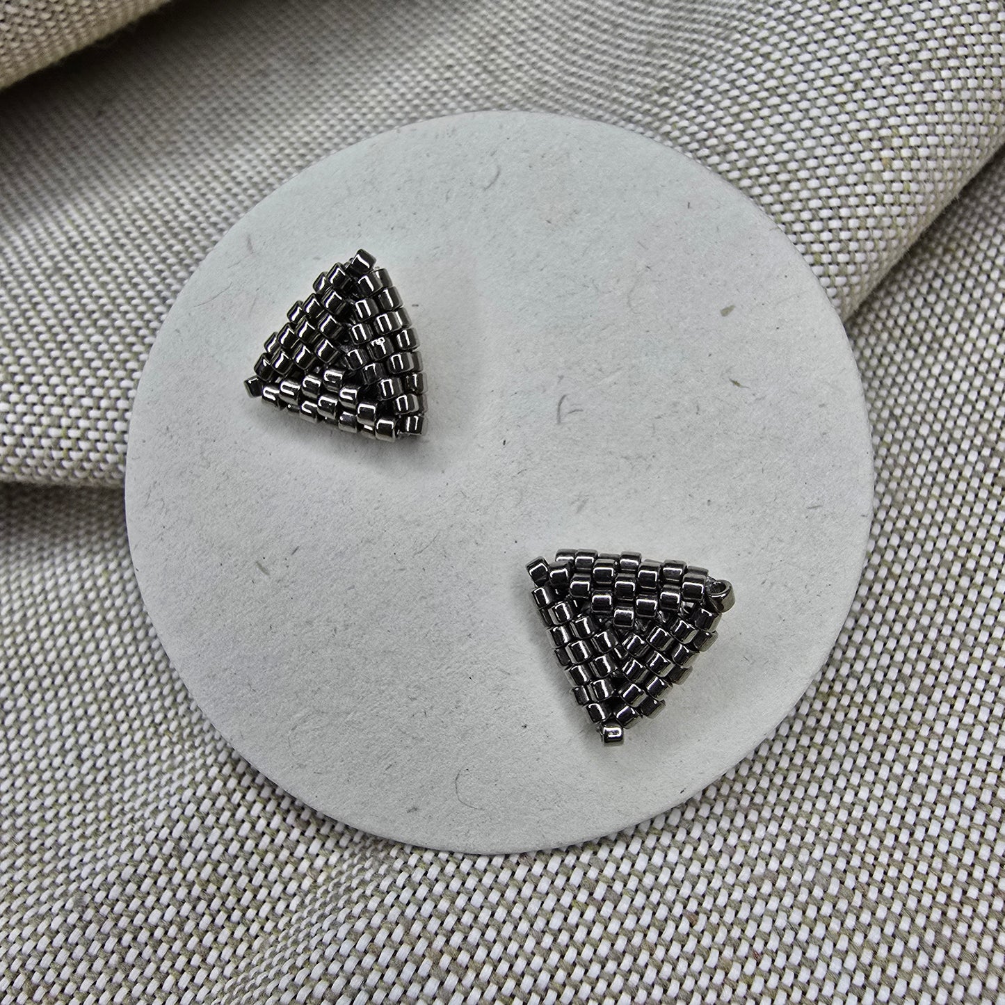 Triangle studs